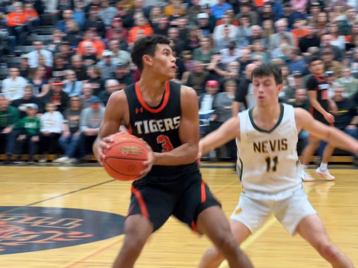 Isaac Asuma looks to pass